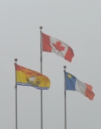 The three flags representing New Brunswick